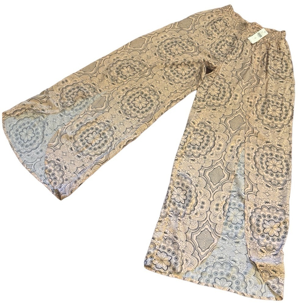 Anthropologie peach and black split leg pants
